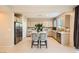 Modern kitchen featuring stainless steel appliances, a center island, and tile backsplash at 625 Loyalty Ct, Henderson, NV 89011