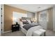 Inviting bedroom with stylish accents, comfortable seating, and a scenic view at 64 Via Montoro, Henderson, NV 89011