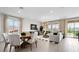 Open-concept living and dining area with mountain views and a cozy atmosphere at 64 Via Montoro, Henderson, NV 89011