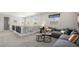 Spacious loft with comfortable seating, stylish decor, and plenty of natural light at 64 Via Montoro, Henderson, NV 89011