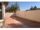 Private backyard features a brick-paved patio area, perfect for relaxing at 6412 Starling Mesa St, North Las Vegas, NV 89086
