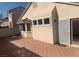 Backyard featuring a brick-paved patio, perfect for enjoying the outdoors at 6412 Starling Mesa St, North Las Vegas, NV 89086