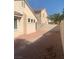 Large backyard featuring a brick-paved patio, ideal for entertaining at 6412 Starling Mesa St, North Las Vegas, NV 89086