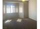 Bedroom featuring multiple windows and a ceiling fan at 6412 Starling Mesa St, North Las Vegas, NV 89086