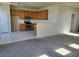 Functional kitchen featuring wood cabinets, stainless steel appliances, and an open floorplan at 7102 Shimmering Ave, Henderson, NV 89011
