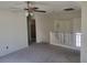 Upstairs Gathering room featuring neutral carpet, bright walls, and decorative light fixtures at 7102 Shimmering Ave, Henderson, NV 89011