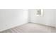 Bright bedroom with neutral carpet and a large window with mountain views at 72 Via Montoro, Henderson, NV 89011