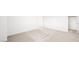 Neutral carpeted bedroom with a walk-in closet and white walls at 72 Via Montoro, Henderson, NV 89011