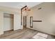 Bedroom with wood-look floors and updated ceiling fan. Updated trim and doors at 7417 Radville Dr, Las Vegas, NV 89129