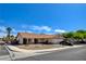 Attractive single-story house with a red tile roof, desert landscaping, and an attached two-car garage at 7417 Radville Dr, Las Vegas, NV 89129
