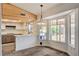 Bright eat-in kitchen with wood ceiling and modern lighting at 7417 Radville Dr, Las Vegas, NV 89129