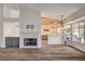 Open floor plan showcases the living room fireplace adjacent to the kitchen at 7417 Radville Dr, Las Vegas, NV 89129