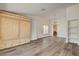 Spacious living room with wood floors and vaulted ceilings at 7417 Radville Dr, Las Vegas, NV 89129
