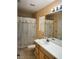Bathroom with white countertop and patterned shower curtain at 7850 Flagler St, Las Vegas, NV 89139