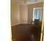Bedroom with laminate floors, modern ceiling fan, and natural lighting from the window at 7850 Flagler St, Las Vegas, NV 89139