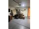 Spacious garage with storage space, gray epoxy floors, and overhead lighting at 7850 Flagler St, Las Vegas, NV 89139