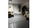 Spacious garage area featuring ample storage space and access door at 7850 Flagler St, Las Vegas, NV 89139