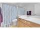 Bathroom with light wood cabinetry, vanity, and a shower-tub combination at 7937 Granite Walk Ave, Las Vegas, NV 89178