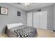 Bedroom with neutral walls, double door closet, and carpeted floors at 7937 Granite Walk Ave, Las Vegas, NV 89178