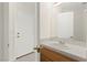 Bathroom featuring a light wood vanity and white countertop at 8934 Pomona Ct, Las Vegas, NV 89147