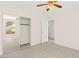 Bedroom features carpet, neutral walls, and sliding door closet at 8934 Pomona Ct, Las Vegas, NV 89147