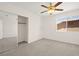 Bedroom with large closet and a bright window at 8934 Pomona Ct, Las Vegas, NV 89147