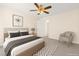 Inviting bedroom with a plush bed, soft lighting, and a calming color scheme for a relaxing retreat at 8934 Pomona Ct, Las Vegas, NV 89147