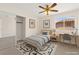 Bright bedroom with a single bed, playful decor, and ample natural light, ideal for a space at 8934 Pomona Ct, Las Vegas, NV 89147