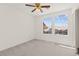 Bedroom with carpet floors, neutral paint, and large windows for natural light at 8934 Pomona Ct, Las Vegas, NV 89147