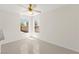 Bright bedroom with tile flooring and multiple windows with exterior views at 8934 Pomona Ct, Las Vegas, NV 89147