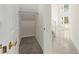 View of closet off the hallway with stairs leading upstairs at 8934 Pomona Ct, Las Vegas, NV 89147