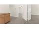 Hallway leading to bedroom and featuring modern carpet at 8934 Pomona Ct, Las Vegas, NV 89147