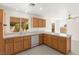 Well-lit kitchen featuring lots of counter space, and bright wood cabinetry at 8934 Pomona Ct, Las Vegas, NV 89147