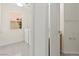 Bright laundry room with tile flooring and white washer and dryer at 8934 Pomona Ct, Las Vegas, NV 89147