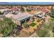 Expansive aerial view of a well-maintained home with manicured landscaping and a cozy covered patio at 10013 Hunter Springs Dr, Las Vegas, NV 89134
