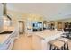 Open concept kitchen with center island, stainless appliances and modern design at 10013 Hunter Springs Dr, Las Vegas, NV 89134