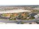 Aerial view of a sports complex with multiple baseball fields, parking, and surrounding community at 10180 Delray Beach Ave # 202, Las Vegas, NV 89129