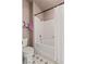 Bathroom featuring a shower-tub combo, complemented by a white shower curtain at 10180 Delray Beach Ave # 202, Las Vegas, NV 89129