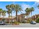 Well-maintained exterior featuring palm trees, and a clearly visible address above the entryway at 10180 Delray Beach Ave # 202, Las Vegas, NV 89129