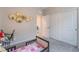 Comfortable bedroom with twin bed, sliding door closet, and neutral tones at 10829 Crestview Pointe Ave, Las Vegas, NV 89166