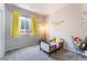 Cozy bedroom with yellow accents, featuring a comfortable bed and inviting decor at 10829 Crestview Pointe Ave, Las Vegas, NV 89166