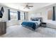 Large bedroom with plenty of natural light, windows, and calm color scheme at 10829 Crestview Pointe Ave, Las Vegas, NV 89166