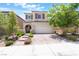 Charming two-story home with a well-maintained front yard and inviting curb appeal at 10829 Crestview Pointe Ave, Las Vegas, NV 89166