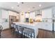 Spacious kitchen featuring a large center island, modern appliances, and ample counter space at 10829 Crestview Pointe Ave, Las Vegas, NV 89166