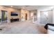 Spacious loft area with neutral colors, modern railing, and ample lighting perfect for a secondary living space at 10829 Crestview Pointe Ave, Las Vegas, NV 89166