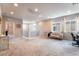 Comfortable loft featuring neutral carpet and paint, plenty of natural light, and versatile layout for a home office at 10829 Crestview Pointe Ave, Las Vegas, NV 89166