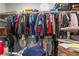 Walk-in closet with ample hanging space and built in shelves for organizing items at 10829 Crestview Pointe Ave, Las Vegas, NV 89166