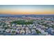 Gorgeous aerial view of the community at sunset at 11569 Velicata Ct, Las Vegas, NV 89138