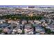 Expansive aerial view of a residential community near the Las Vegas strip at dusk at 11569 Velicata Ct, Las Vegas, NV 89138