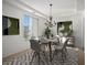 Bright dining room featuring stylish furnishings and modern decor at 11569 Velicata Ct, Las Vegas, NV 89138